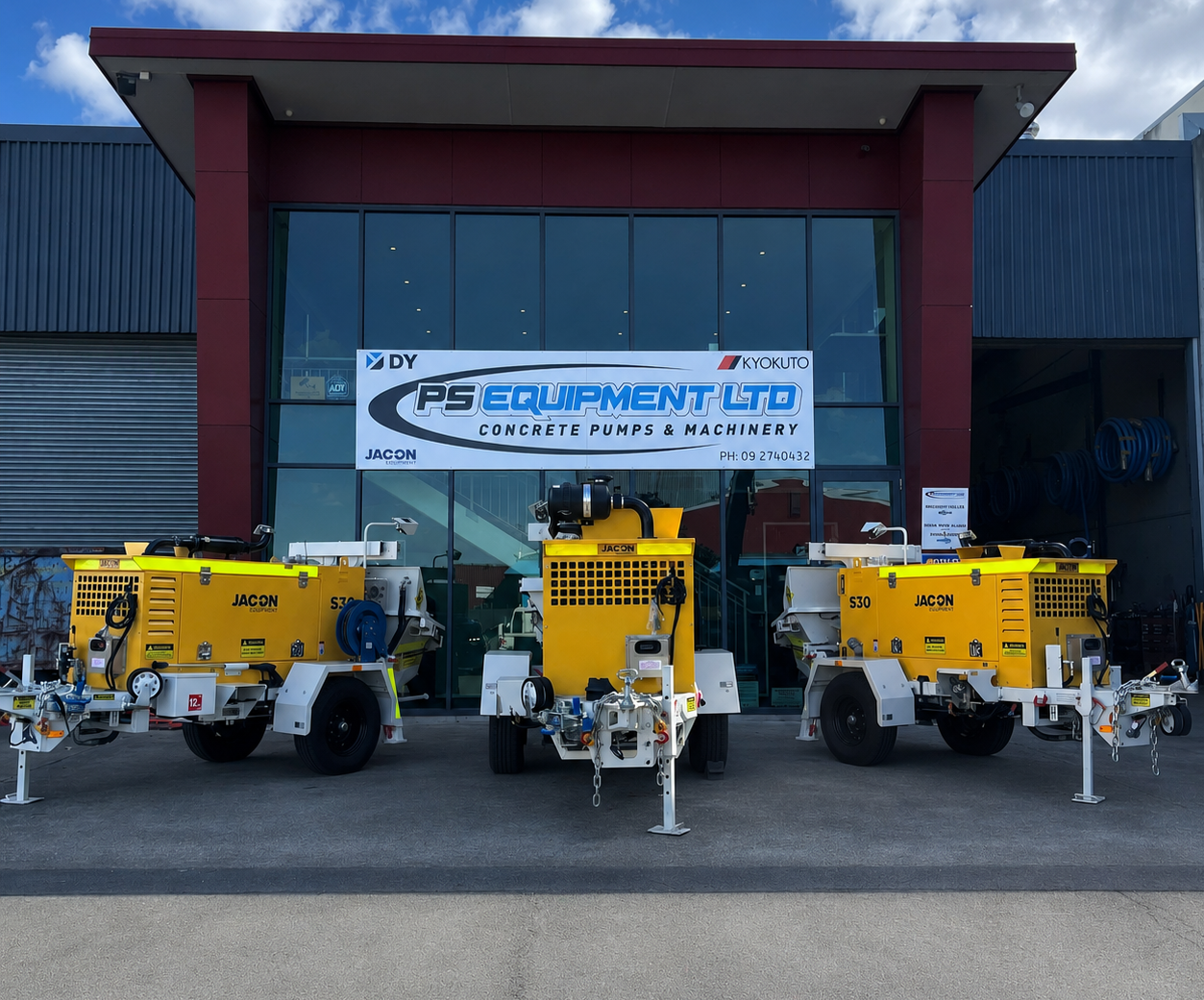 PS Equipment team outside the Auckland workshop with a new Jacon trailer pump and STG hydro-excavation truck